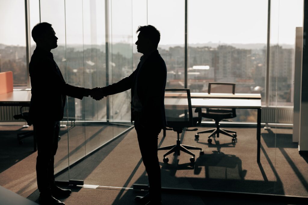 Broker shaking hand